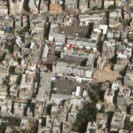 A satellite image shows people sheltering at school in Gaza City, October 19, 2023. Maxar Technologies