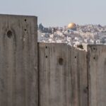 Dome of the Rock and Israeli separation wall stock photo. Gaza