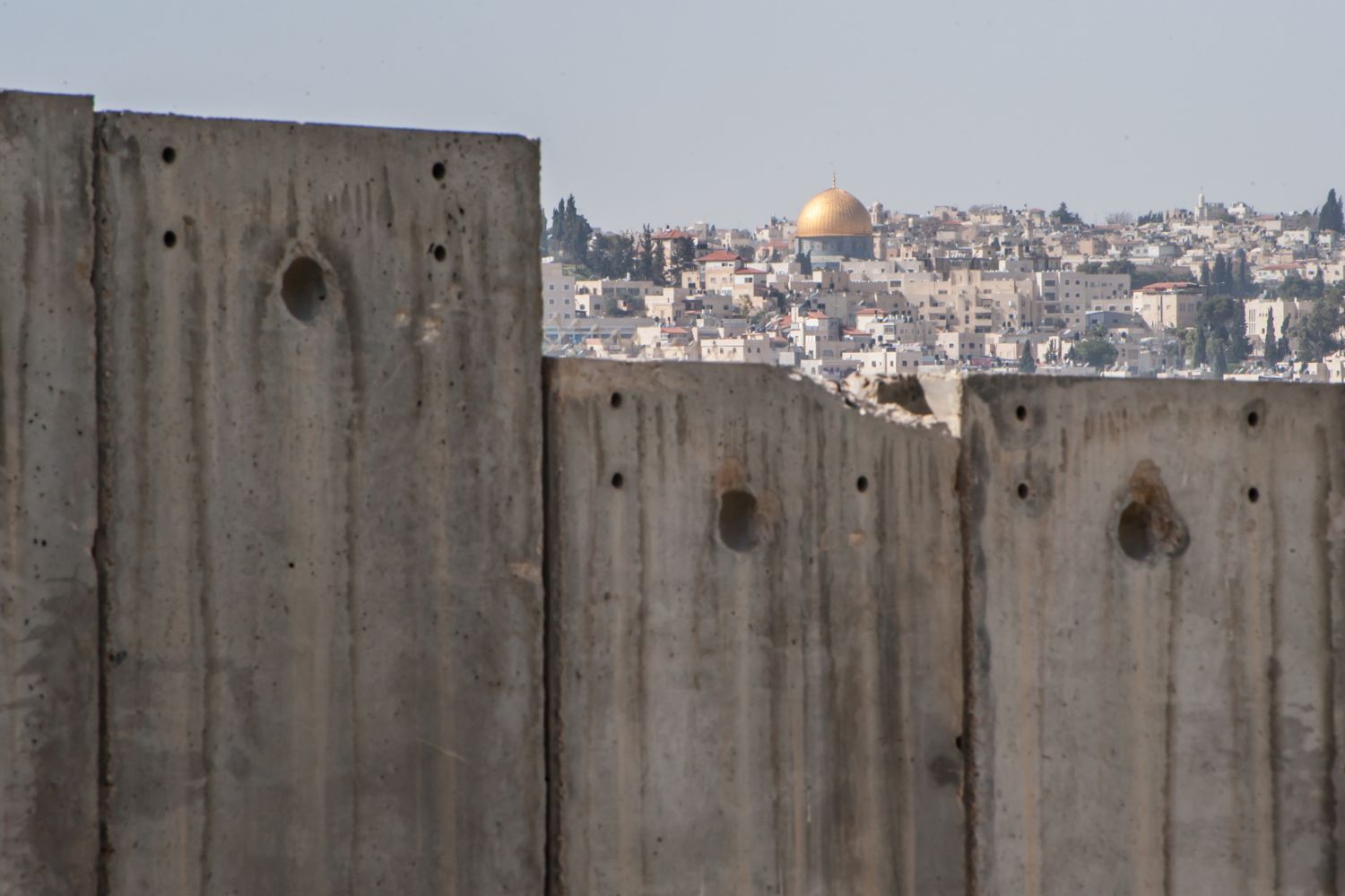 Dome of the Rock and Israeli separation wall stock photo. Gaza