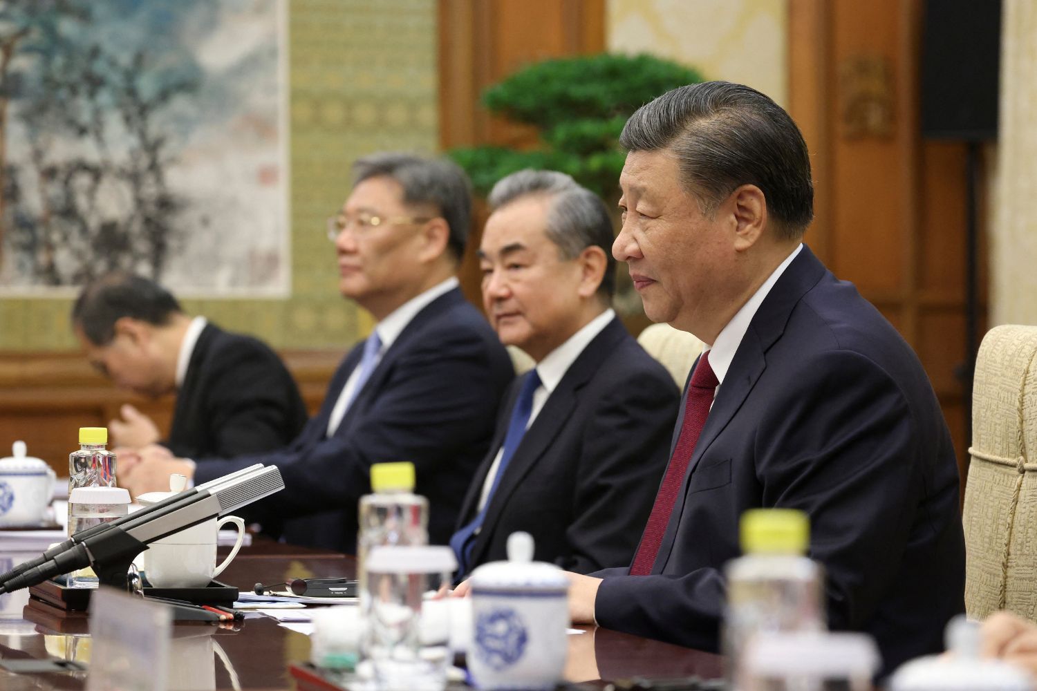 This handout photo taken and released by the European Council Press Service on December 7, 2023 shows China's President Xi Jinping (R) and China's Foreign Minister Wang Yi (2nd R) attending the 24th EU–China Summit in Beijing.