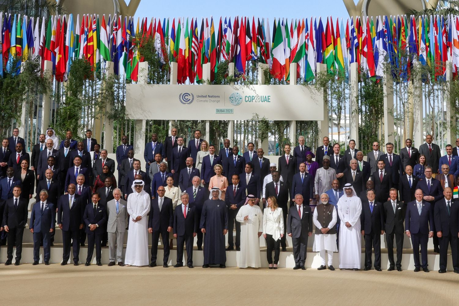 Participating world leaders and delegates pose for a family photo during the COP28 United Nations climate summit in Dubai on December 1, 2023. World leaders take centre stage at UN climate talks in Dubai on December 1, under pressure to step up efforts to limit global warming as the Israel-Hamas conflict casts a shadow over the summit.