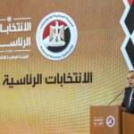 Hazem Badawy, head of Egypt's National Elections Authority, announces the results of the 2024 Egyptian presidential elections in Cairo on December 18, 2023. Egypt's President Abdel Fattah al-Sisi has won a new six-year term with 89.6 percent of the vote, the election authority announced on December 18. Turnout reached an "unprecedented" 66.8 percent of Egypt's 67 million voters, said its chief, Hazem Badawy. Over 39 million voted for Sisi, a former army chief who has ruled the most populous Arab country for a decade. (Photo by Ahmed HASAN / AFP)