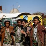 Shiite fighters, known as Houthis, chant slogans during a tribal gathering showing support for the Houthi movement in Sanaa, Yemen, Thursday, Dec. 10, 2015.