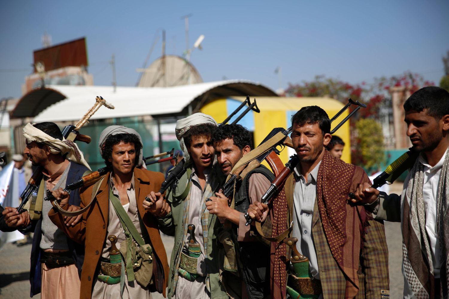 Shiite fighters, known as Houthis, chant slogans during a tribal gathering showing support for the Houthi movement in Sanaa, Yemen, Thursday, Dec. 10, 2015.