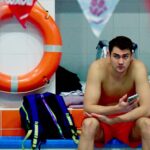 Russian swimmer Kliment Kolesnikov takes part in the "Vladimir Salnikov Cup" international swimming competition in Saint Petersburg on December 17, 2023. The world record holder in the men's 50m backstroke has vowed to sit out the Paris Games over the "unacceptable" conditions imposed on Russian competitors due to the assault on Ukraine. (Photo by Olga MALTSEVA / AFP)