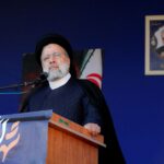 his handout picture provided by the Iranian presidency on January 5, 2024, shows Iran's President Ebrahim Raisi speaking during the funeral of victims killed in twin blasts on January 3, as they took part in a commemmoration marking the anniversary of the killing of Revolutionary Guards general Qasem Soleimani in the southern city of Kerman. Iranian President Ebrahim Raisi joined mourners in Kerman on January 5 for the funerals of the 89 people killed in twin blasts claimed by the Islamic State group, state media said. (Photo by Iranian Presidency / AFP)