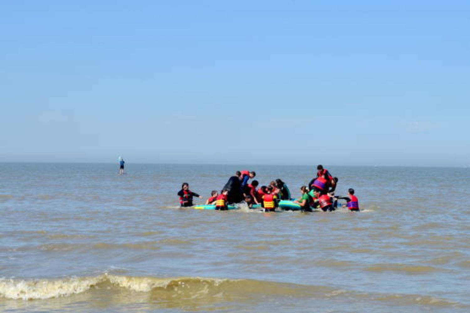 Migrants aboard inflatable boats as they cross the English Channel.